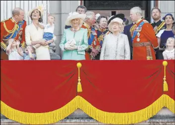  ?? Frank Augstein The Associated Press ?? Britain’s Queen Elizabeth, center right, and members of the royal family attend the annual Trooping the Colour Ceremony on Saturday in London.