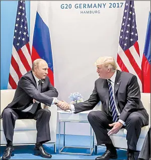  ?? AP/MIKHAIL KLIMENTYEV ?? President Donald Trump and Russian President Vladimir Putin meet for the first time Friday in Hamburg, Germany, at the Group of 20 summit.