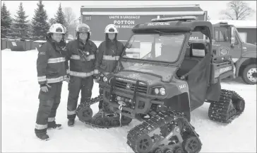  ?? COURTESY ?? Shawn Pouliot( Captain), Stephane Fortin (Captain) and Ronney Korman (Director of Fire Prevention and Safety for the Municipali­ty of Potton) pose next to the side by side all rescue vehicle.