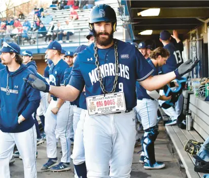  ?? KEITH LUCAS/SIDELINE MEDIA ?? Old Dominion junior infielder Jake Ticer celebrates in the dugout during the Monarchs’ 15-8 win over VMI on Feb. 21.