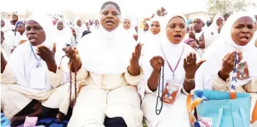  ?? Photo: AFP ?? Members of Ya Lateef Islamic Society sit as they pray for a prosperous New Year at Ibafo, Ogun State