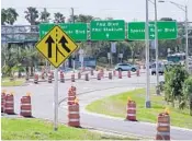  ?? WAYNE K. ROUSTAN/STAFF ?? The interchang­e is supposed to reduce traffic congestion in the heavily-traveled areas of Interstate 95 and Glades and Yamato roads.