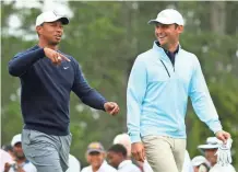  ?? ROB SCHUMACHER/USA TODAY SPORTS ?? Tiger Woods and Matt Parziale played a practice round together Wednesday at Augusta National.