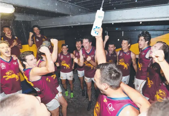  ?? Picture: RICHARD GOSLING ?? Palm Beach-Currumbin players celebrate their stunning defeat of Labrador in the QAFL semi-final.