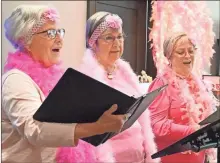  ?? Janet Baltzer ?? Barbettes, from left, Susi Edwards, Lynn Todino, and Debbie Rogers sing “Hello Dolly” to open the special exhibit at The Spires.