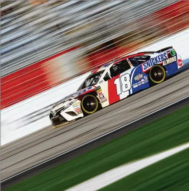  ?? JERRY MARKLAND / GETTY IMAGES ?? Kyle Busch, who won the pole for today’s race, says starting from the front is important at Atlanta Motor Speedway. “It’s so hard on tires here, you don’t want to roll back on tires and pass a lot of cars,” he said.