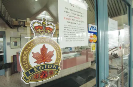  ?? BRITTON LEDINGHAM ?? A sign at the Royal Canadian Legion Branch 284 at 606 38th Avenue N.E. on Friday reads that the Chapelhow branch will be closed from Aug. 5 until Sept. 1. Employees have signed a confidenti­ality agreement.