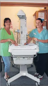  ??  ?? Helping hand: The Pohlen Foundation Trust is hoping to have an Ohio resuscitat­ion trolley in each of the birthing units at Pohlen Hospital’s maternity unit rather than one shared by both suites. Pictured with the trolley are midwife Cherie Coe and...