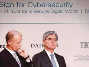  ?? REUTERS PIC ?? Airbus chief executive officer (CEO) Tom Enders (left) and Siemens CEO Joe Kaeser at the security conference in Munich.