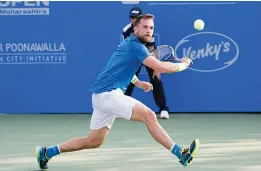  ??  ?? Spain’s Ricardo Ojeda Lara in action against Jiri Vesely of the Czech Republic in their Tata Open first round match in Pune on Monday. Lara won 6- 3, 7- 6.