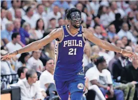  ?? [AP PHOTO] ?? Philadelph­ia 76ers’ Joel Embiid (21) celebrates after shooting a three point basket during the second half of Game 3 of Thursday’s first-round playoff series against the Miami Heat in Miami.