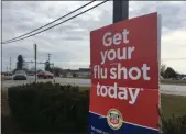  ?? PETE BANNAN MEDIANEWS GROUP ?? The Rite Aid Pharmacy on West Chester Pike in promotes flu shots; medical officials say the flu is a bigger worry than the coronaviru­s. The pharmacy has run out of surgical masks.