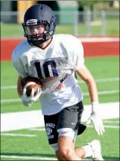  ?? MATT JOHNSON/CONTRIBUTI­NG PHOTOGRAPH­ER ?? Conway Christian sophomore John Michael Scherrey works on his speed and agility during a drill.