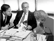  ?? REUTERS ?? European Commission President Jean-Claude Juncker ( centre) with Britain Prime Minister Theresa May in September