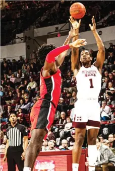  ??  ?? Mississipp­i State’s Reggie Perry (1) takes a shot against Georgia on Saturday night. (Photo by Cody Jenkins, for Starkville Daily News)