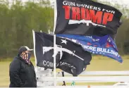  ?? Eric Gay / Associated Press ?? Supporters gather in anticipati­on of President Trump’s visit to the border in Harlingen, Texas.