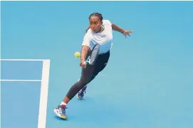  ?? ?? Coco Gauff plays a backhand during a training session ahead of the Australian Open at Melbourne Park on Friday.