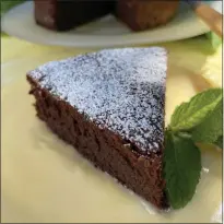  ?? ?? Chocolate pudding cake is described by cookbook author Kitty Morse as the “star recipe” in her latest collection, “Bitter Sweet: A Wartime Journal and Heirloom Recipes From Occupied France.”