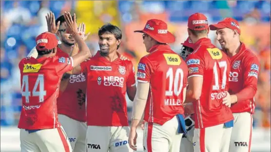  ?? AFP ?? Kings XI Punjab will be expecting their key bowler Sandeep Sharma (third from left) to guide them into the IPL playoffs, even though the task is very difficult.