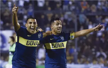  ?? FOTO: AP/GUSTAVO GARELLO ?? Ramon Abila och Carlos Tevez bildar ett fruktat par i Bocas offensiv. Dario Benedetto är också en måltjuv av rang.