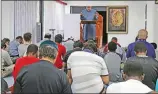  ?? Nikolas Samuels/The Signal ?? Omar Jubran, center, leads an afternoon prayer service at the Islamic Center of the Santa Clarita Valley on July 15.