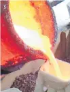  ??  ?? Pouring molten bronze in Jonathan Campbell’s Wellington foundry.