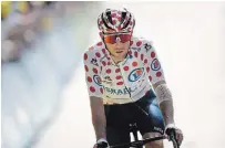  ?? CHRISTOPHE ENA THE ASSOCIATED PRESS FILE PHOTO ?? Pandemic restrictio­ns leave Canadian cyclist Michael Woods feeling like the Olympics are just another bike race.