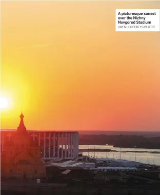  ?? OWEN HUMPHREYS/PA WIRE ?? A picturesqu­e sunset over the Nizhny Novgorod Stadium