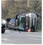  ??  ?? DEBRIS Duke’s car flipped on its side