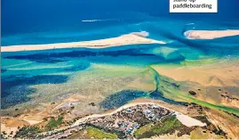  ??  ?? LAGOON SHOWBarret­a Island, below. Far right: stand-up paddleboar­ding