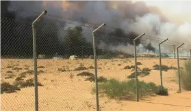  ?? Dubai Civil Defence ?? The blaze at the cattle farm yesterday in Al Faqa, Dubai.