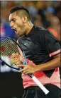  ?? CAMERON SPENCER / GETTY IMAGES ?? Nick Kyrgios celebrates set point in his third-round, four-set victory against Jo-Wilfried Tsonga.