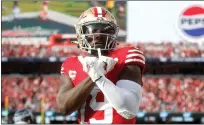  ?? Nhat V. Meyer / Bay Area News Group ?? San Francisco 49ers’ Deebo Samuel (19) celebrates his touchdown against the Seattle Seahawks at Levi’s Stadium in Santa Clara on Dec. 10.