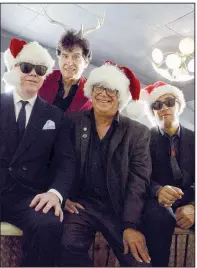  ??  ?? Toby Dammit (from left), Tav Falco, Mike Watt and Mario Monterosso collaborat­e on A Tav Falco Christmas. “It’s a brilliant band,” Falco says. Monterosso also produced the recording.