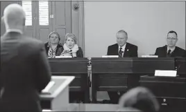  ?? [ADAM CAIRNS / DISPATCH] ?? Members of an Ohio House committee, from left, Reps. Dorothy Pelanda, R-Marysville; Bill Reineke, R-Tiffin; and Louis Blessing, R-Cincinnati, hear testimony from Chad Aldis of the Fordham Institute about merging several education department­s at the...