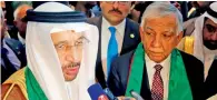  ?? — Reuters ?? Saudi and Iraqi oil ministers Khalid Al Falih and Jabar Al Luaibi at a news conference in Baghdad on Saturday.