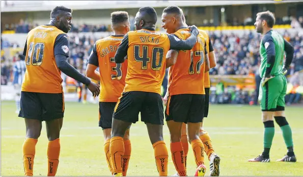  ?? PICTURES: Action Images ?? GOLDEN MOMENT: Wolves’ David Edwards celebrates scolring their first goal with Rajiv van La Parra, Nouha Dicko and Bakary Sako