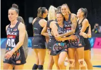  ?? Photo / Michael Bradley Photograph­y ?? The Magic’s Claire Kirsten and Erena Mikaere show the team’s close spirit in their recent ANZ Premiershi­p match against the Mystics in Hamilton.