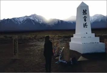  ?? BRIAN MELLEY — THE ASSOCIATED PRESS FILE ?? Lori Matsumura visits the cemetery at the Manzanar National Historic Site near Independen­ce.