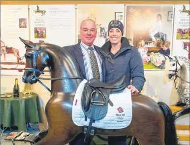  ??  ?? Olympic dressage rider Charlotte Dujardin and Marc Stevenson from the company with the rocking horse