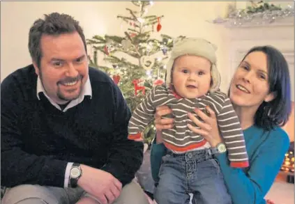  ??  ?? Craig and Fiona with a young Robert. Tragically, Fiona died in 2012 along with her unborn daughter Isla