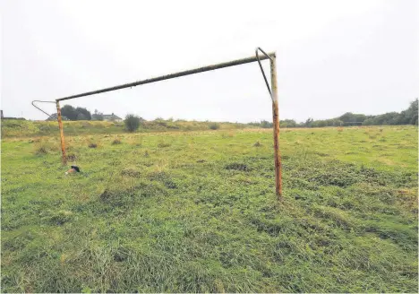  ??  ?? Striking out The condition of football pitches like this one near Coltswood cemetery in Coatbridge were up for debate