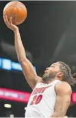  ?? SARAH STIER/GETTY-AFP ?? The Heat’s Justise Winslow attempts a layup in the first quarter against the Nets on Wednesday. He finished with six points and 11 rebounds.