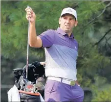  ?? JAMIE SQUIRE/GETTY ?? Sergio Garcia pulls a club from his bag during a practice round Wednesday.