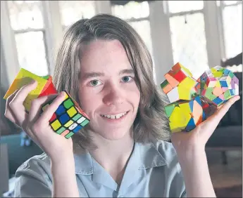  ??  ?? FAST FINGERS: Horsham College student and 2019 World Cubing Championsh­ips competitor Oscar Watson can solve more than 10 different types of Rubik’s cubes. He will be one of many Wimmera cubing enthusiast­s to compete at the second Horsham Speedcubin­g Competitio­n at Horsham West and Haven Primary School at the weekend. Picture: PAUL CARRACHER