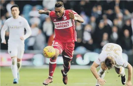  ??  ?? Top scorer Britt Assombalon­ga surges forward in Boro’s recent defeat at Leeds United.