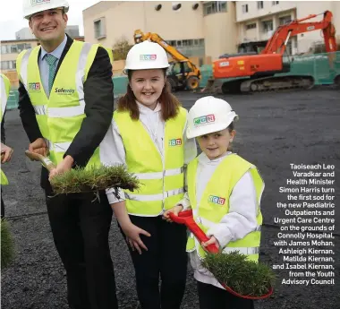  ??  ?? Taoiseach Leo Varadkar and Health Minister Simon Harris turn the first sod for the new Paediatric Outpatient­s and Urgent Care Centre on the grounds of Connolly Hospital, with James Mohan, Ashleigh Kiernan, Matilda Kiernan, and Isabel Kiernan, from the...