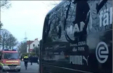  ?? PHOTO ?? A window of the bus of Borussia Dortmund is damaged after an explosion before the Champions League quarterfin­al soccer match against AS Monaco in Dortmund, western Germany, Tuesday. AP