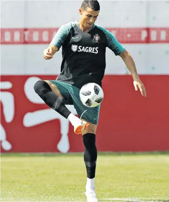  ?? THE ASSOCIATED PRESS ?? Portugal’s Cristiano Ronaldo, shown here in practice Sunday, has a mediocre squad to work with at the World Cup, but he’s been hell bent to push them through to the Round of 16 knockout stage.
