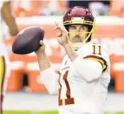  ?? RICK SCUTERI/AP ?? Washington quarterbac­k Alex Smith is expected to start tonight at Philadelph­ia, according to NFL Media. Washington can clinch the division with a win.